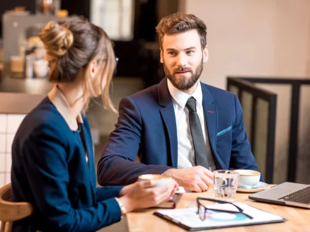 Career Coaching - image of man and woman having a meeting